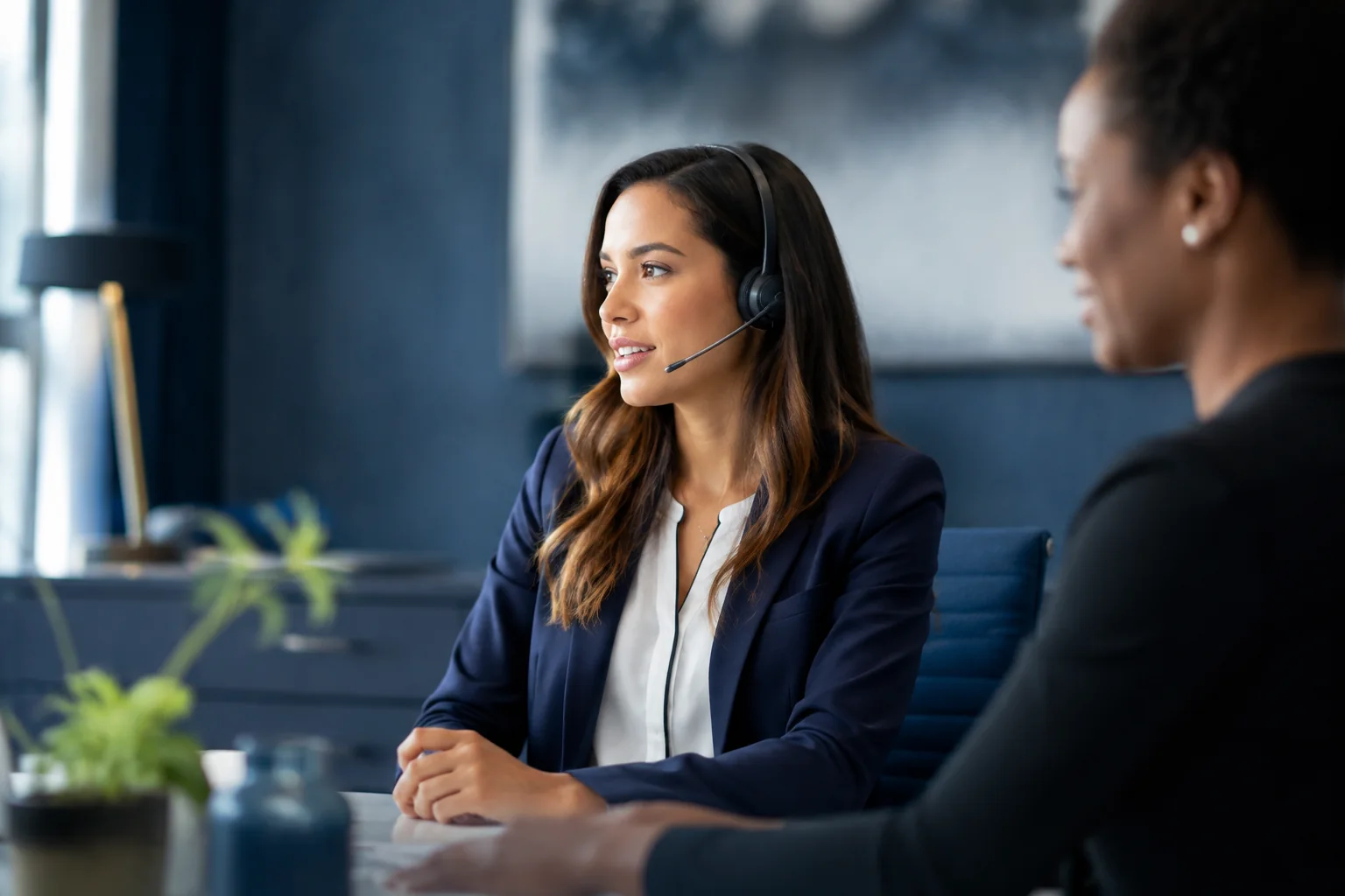 Customer support colleagues collaborating in a contemporary office